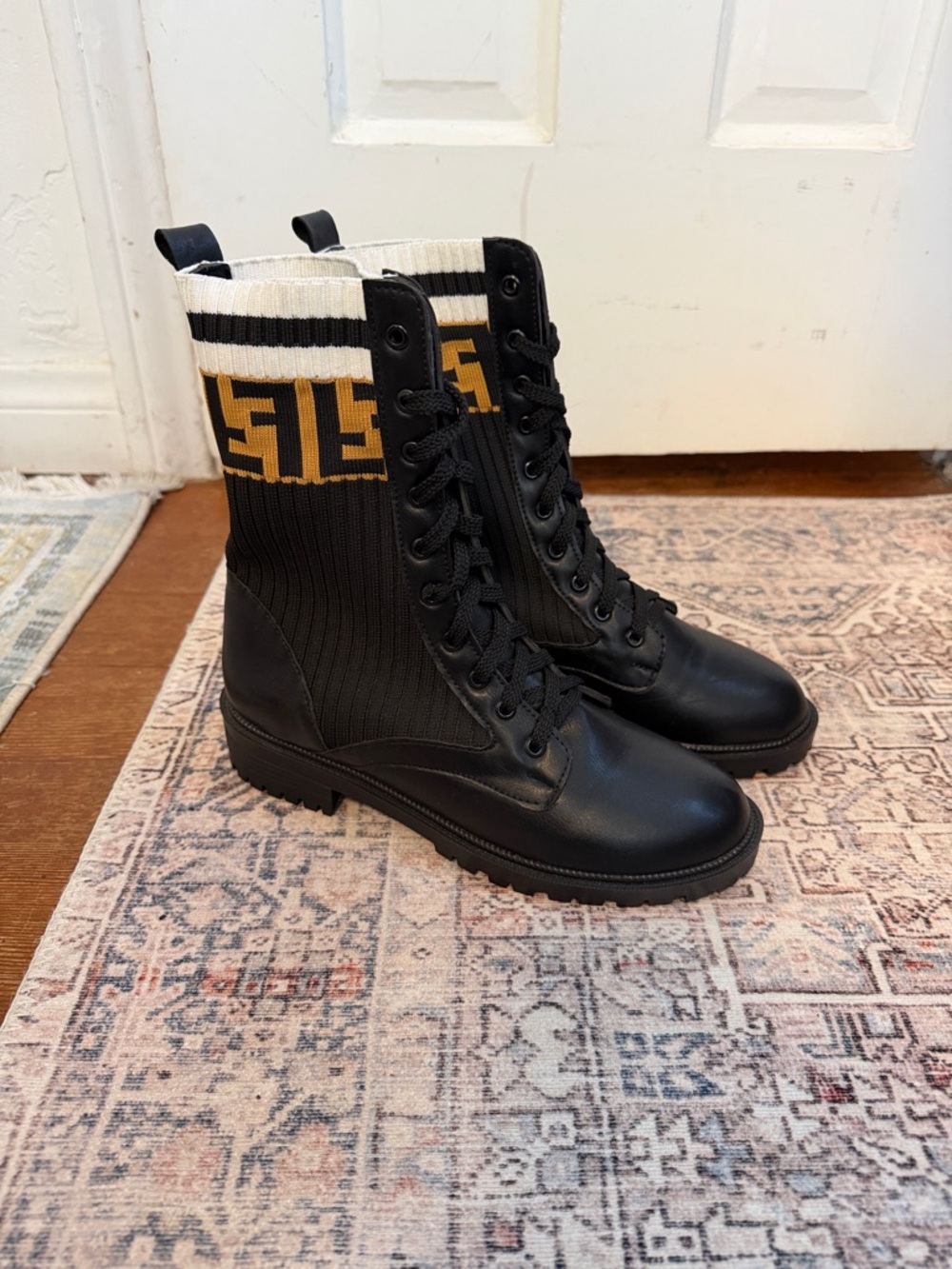 Black Lace-Up Knit Combat Boots with Gold Logo Stripe
